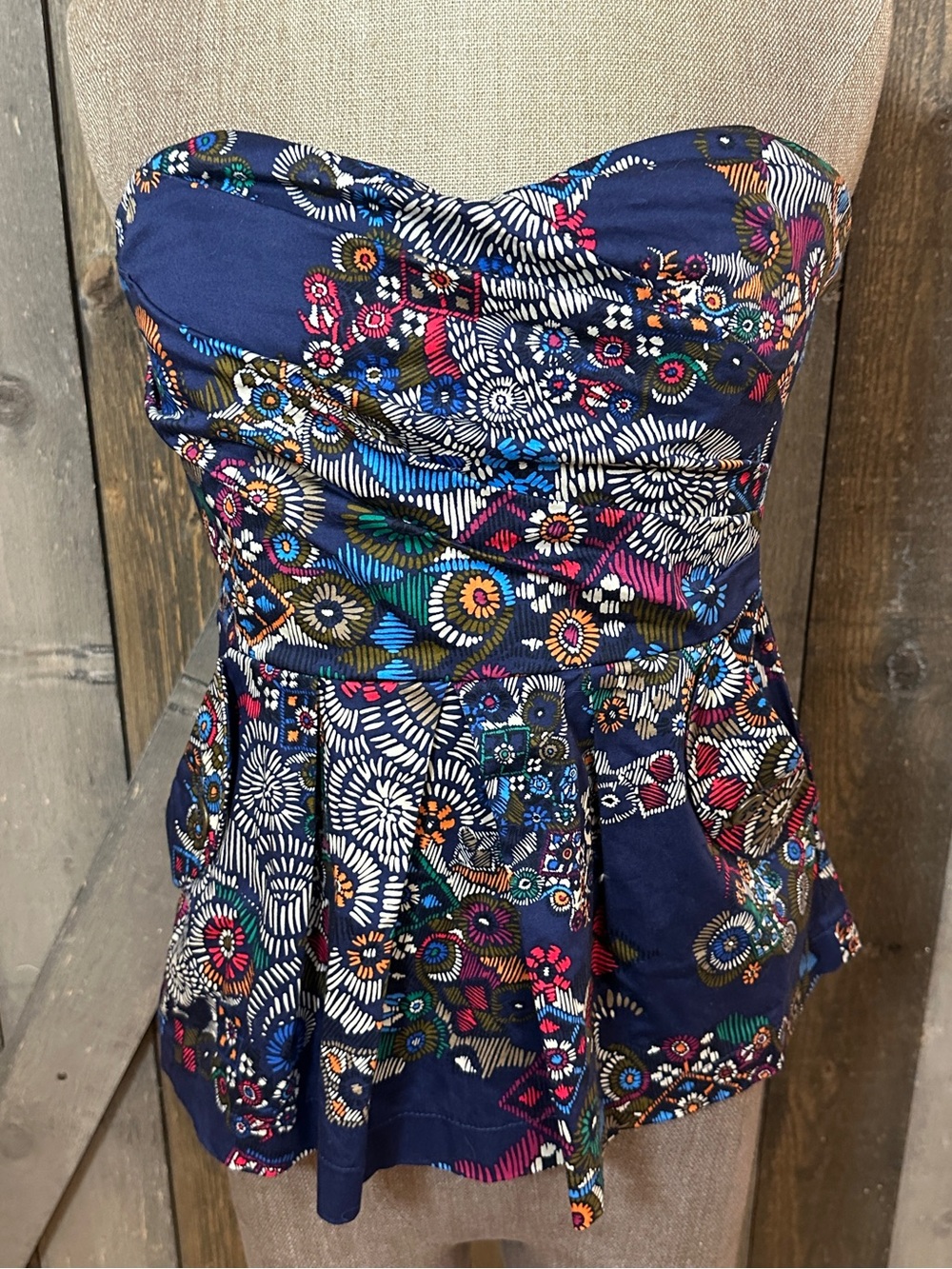Anthropologie Navy Strapless Floral Peplum Top
